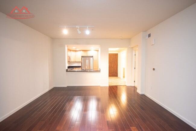 Building Photo - Charming 1 Bedroom/1 Bath Condo with Private Backyard & Double Parking Spaces