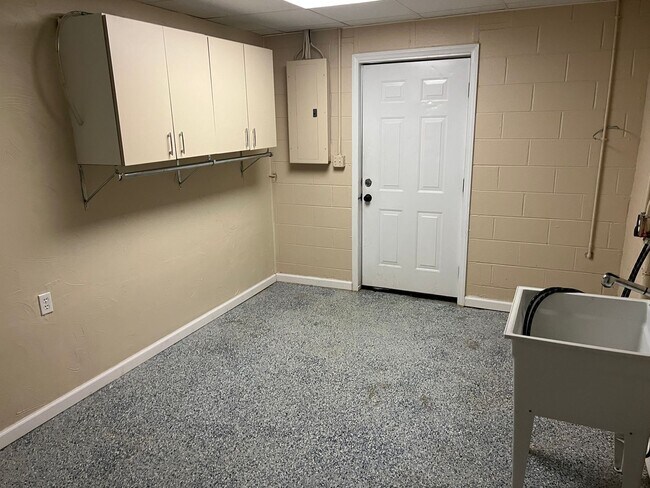 Building Photo - Unit is no longer available - application approved.  Charming 1 1/2 story brick home with basemen...