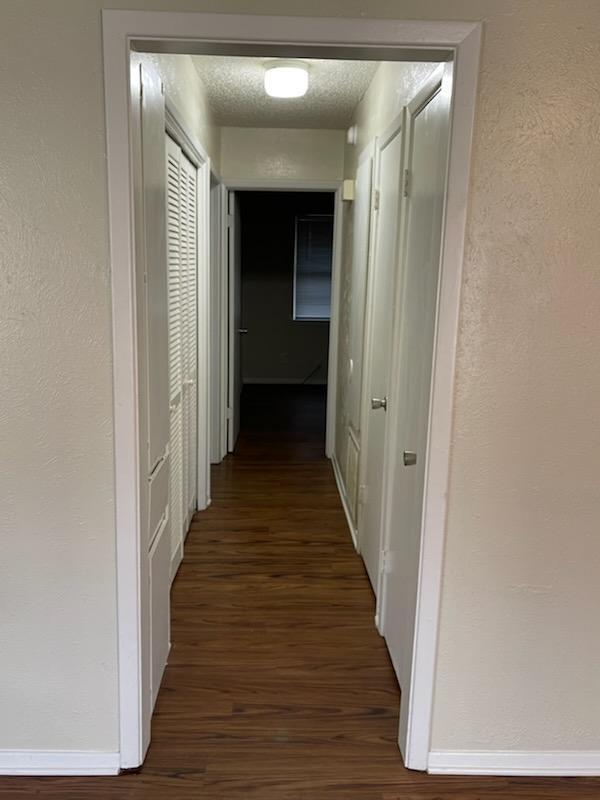 Building Photo - AVAILABLE NOW. GRANITE COUNTERTOPS. Spacious single-level Townhome with upgraded flooring throughout