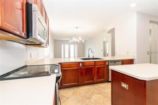 Building Photo - 9763 Moss Rose Way