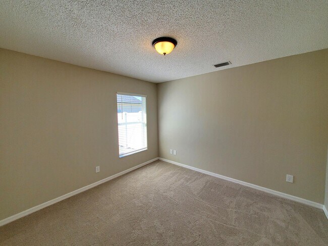 Building Photo - 5551 Cinnamon Fern Blvd