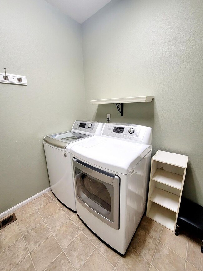 Building Photo - Boastful 3 Bedroom West Side home in gated...
