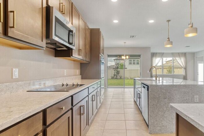 Building Photo - Discover luxury living in the gated Whispe...