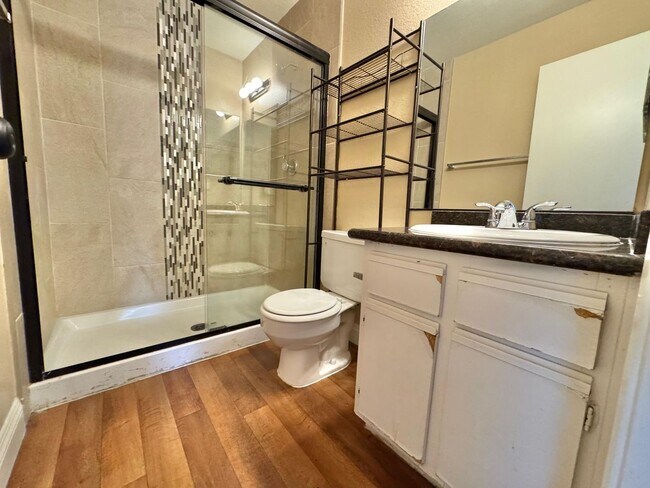 Building Photo - THIS SECOND-FLOOR DESERT SHORES CONDO OFFE...