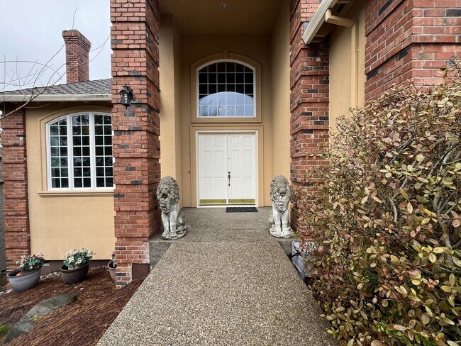 Building Photo - Executive-Style Northwest Heights Home with Forest Views and Refined Architectural Details