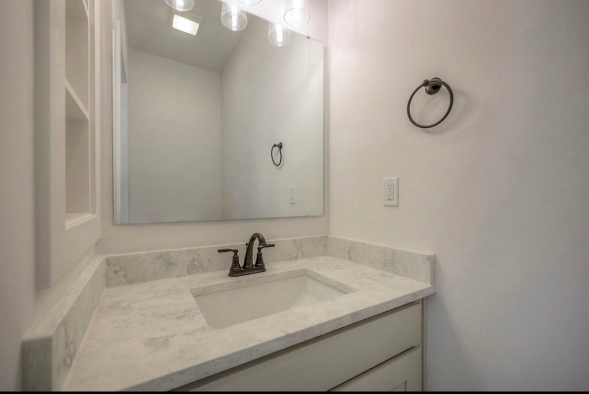 main level guest bathroom - 22907 W 72nd Ter