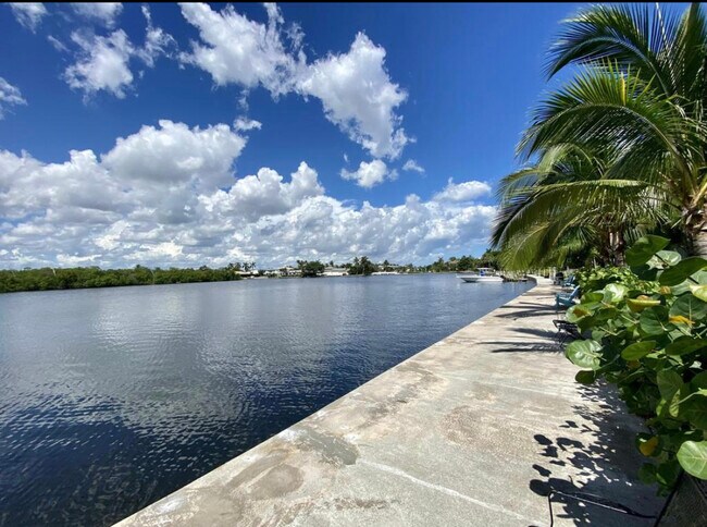 Blue skies and puffy clouds - 6520 N Ocean Blvd