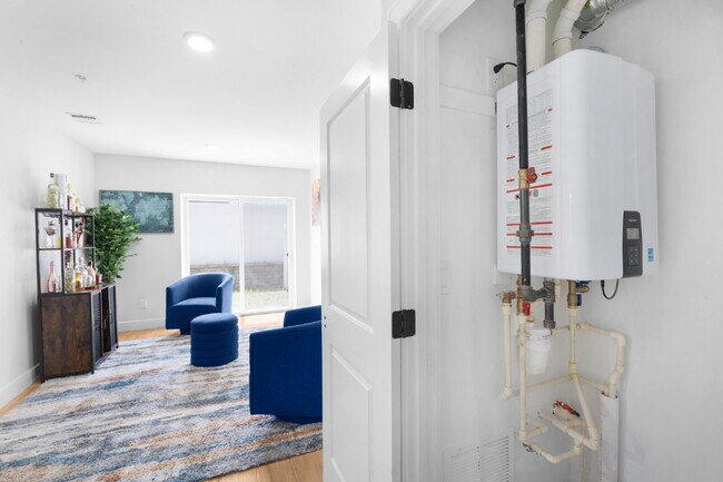 Building Photo - Movie in special, first 1/2 month rent is FREE! Charming 2-Bedroom Condo with 2 Full & 2 Half Bat...