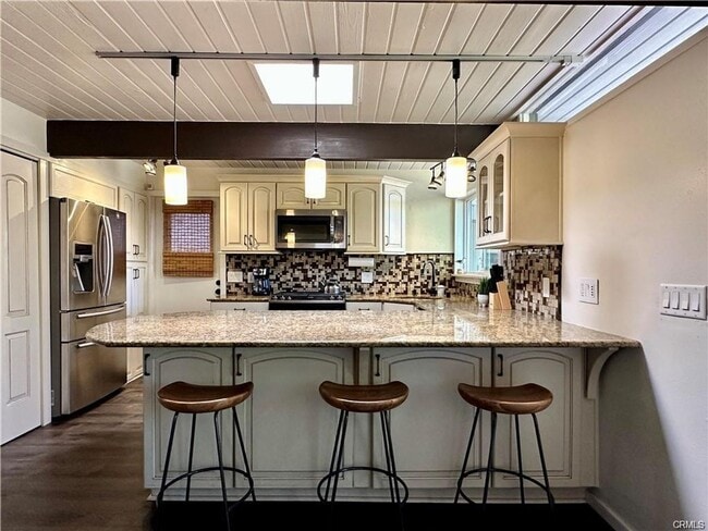 Building Photo - Fully furnished mid-century modern oasis located less than a mile