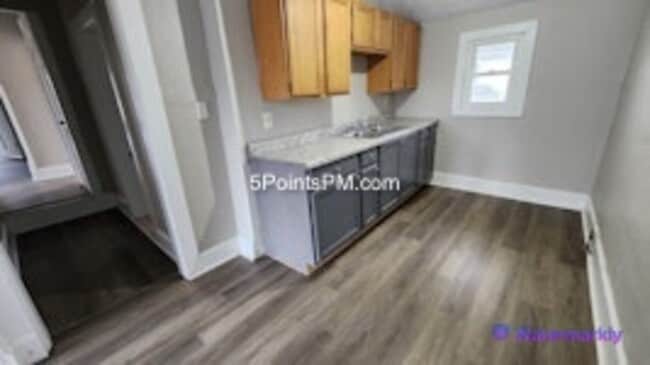 Building Photo - 9804 Miles Ave