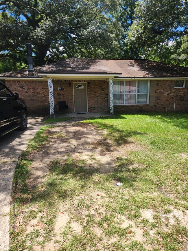 Building Photo - 6945 Woodley Dr