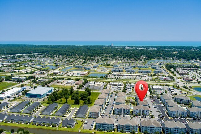 Building Photo - The Villages at Queens Harbour II