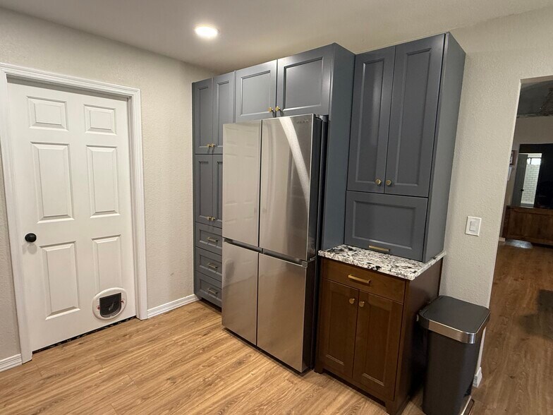 Door leads to laundry room - 1460 E Kent Ave