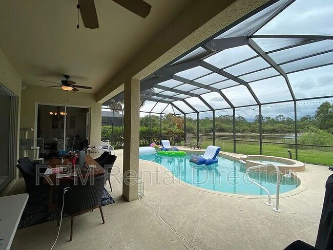 Building Photo - 4-Bedroom W/Den Lakefront Pool Home with Spa in Gated Promenade East at The Forum