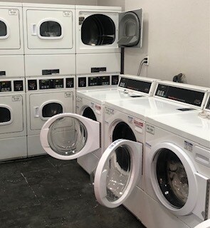 Two laundry rooms in building - 1440 Veteran Ave