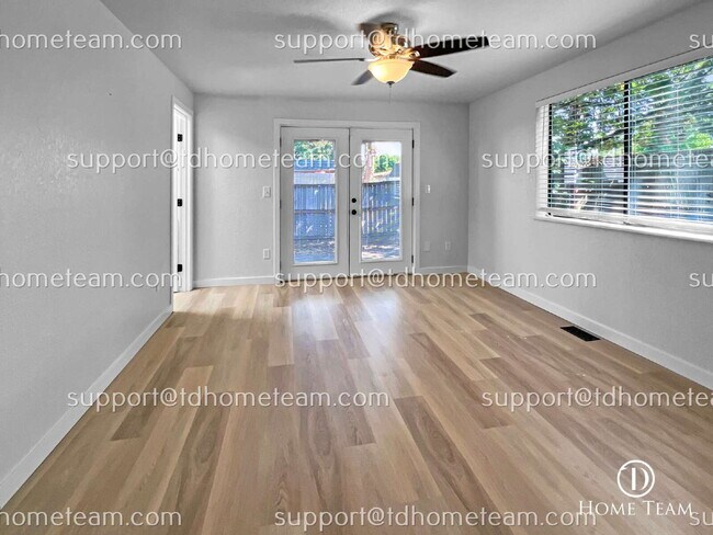 Building Photo - "Charming 3-Bedroom Retreat with Cozy Fire...