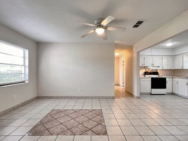 Building Photo - Three-Bedroom Home with Spacious Family Bo...
