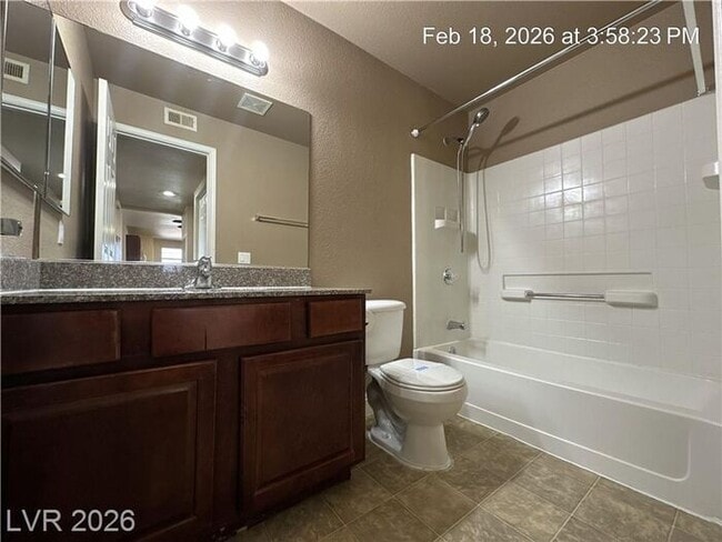 Building Photo - Bright Northwest Second-Floor Condo with Oversized Balcony & Community Pool!