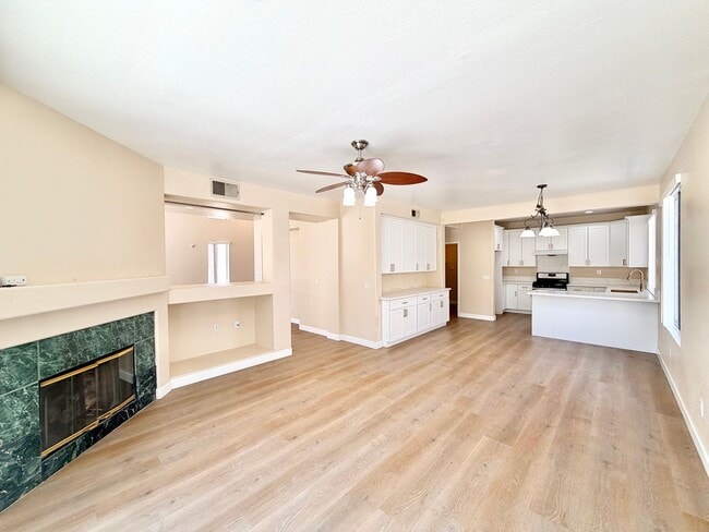 Building Photo - Spacious 5 Bedroom Home with 3 Car Garage & Primary Suite Balcony