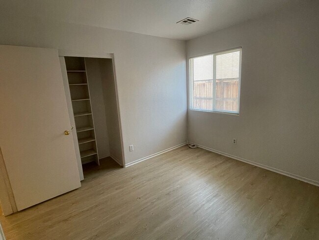 Building Photo - Adelanto Home-3 Bedrooms,2 Bathrooms, Laminate Floors, Indoor Laundry Room, Large Back Yard