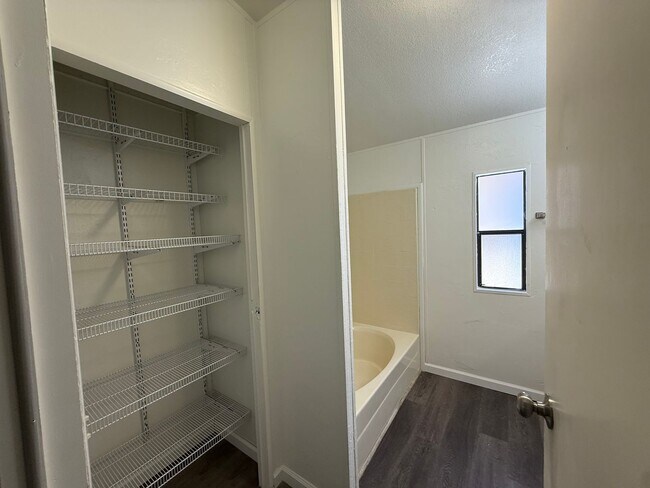 Building Photo - Large Remodeled Doublewide with 2 Car Garage.