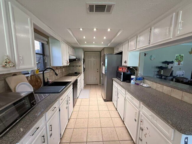 Building Photo - 3107 Wagon Trail Dr