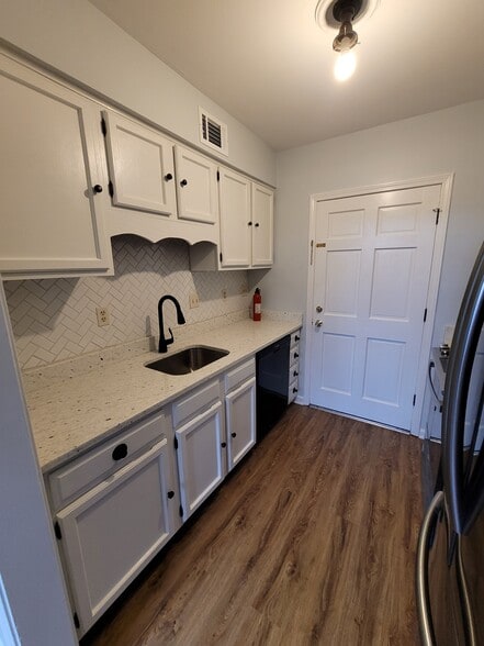 Galley kitchen with new counters - 2270 Tunis Cv
