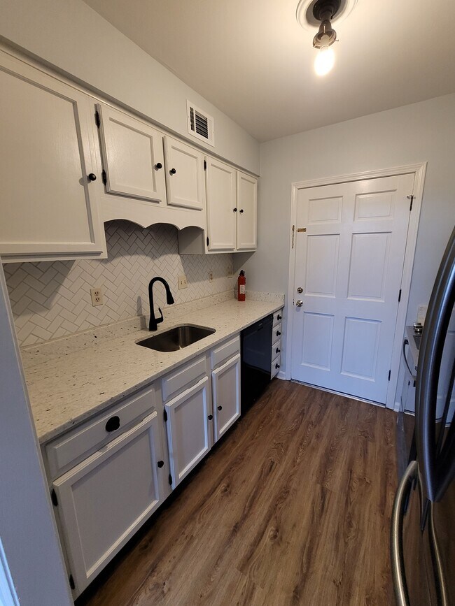 Galley kitchen with new counters - 2270 Tunis Cv