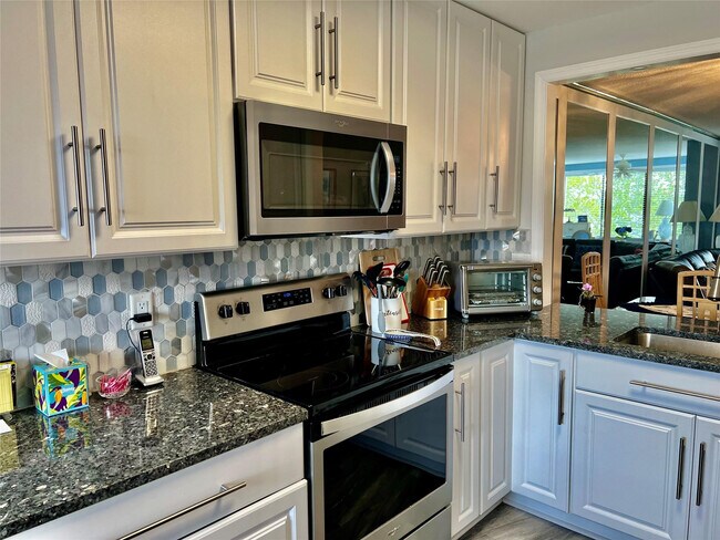 Building Photo - 9787 N Belfort Cir