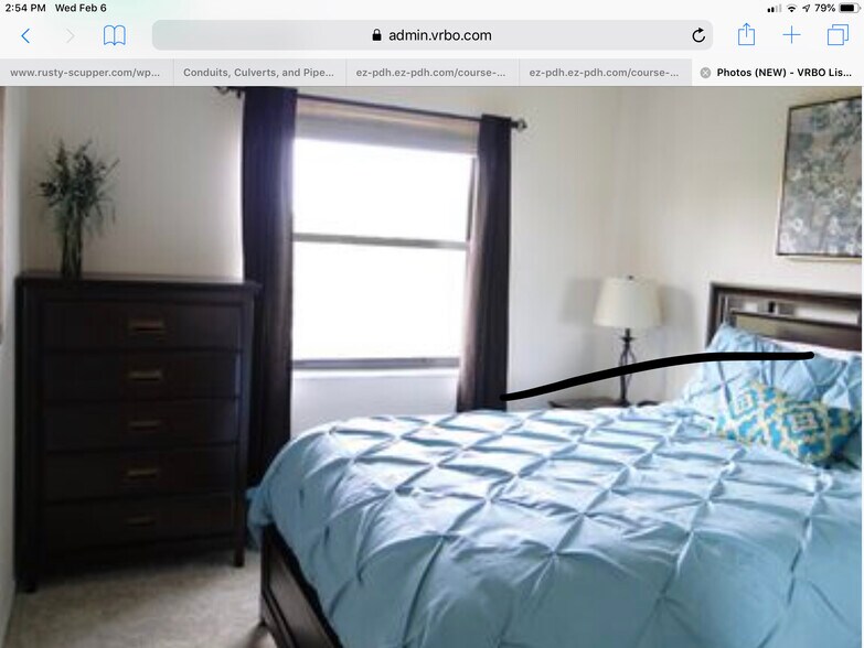 2nd bedroom with a private feel, large closet, and view of pond. - 5265 Brisata Circle