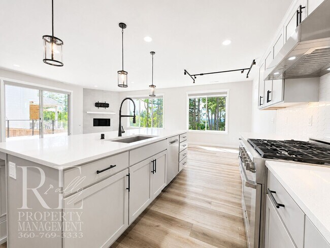 Building Photo - Luxury Poulsbo Retreat with Water Views, Covered Deck & Designer Finishes