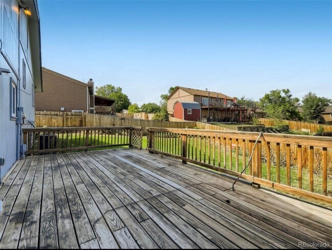 Building Photo - 1293 E 97th Ave