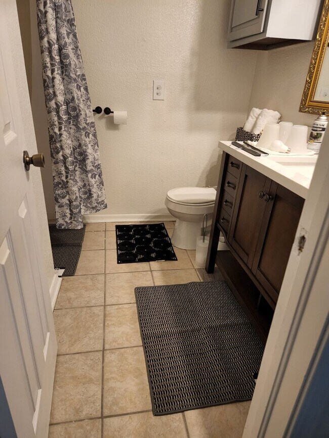 Building Photo - Updated 3-Bedroom with Vaulted Ceilings and Corner Lot Charm