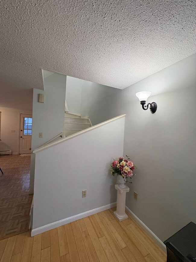 Building Photo - 10% off  1st month rent. Spacious 3 Bedroom, 2 Bath Townhouse with In-Unit Laundry in Lowell, MA