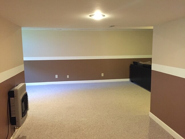 Building Photo - {7301} Quiet Cul-de-sac + Three Car Garage + Updated Kitchen + Finished Basement + Bedroom Level ...