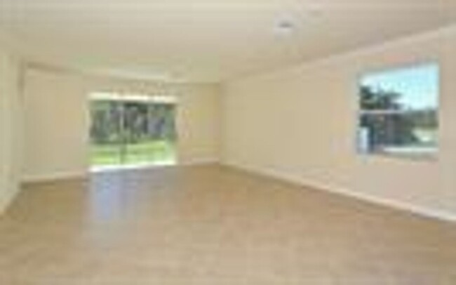 Building Photo - 4 bedroom, 3 bath, 2-car Garage