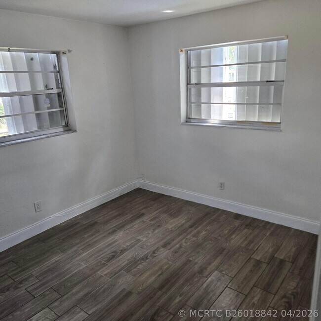 Building Photo - 3860 NW 8th Pl