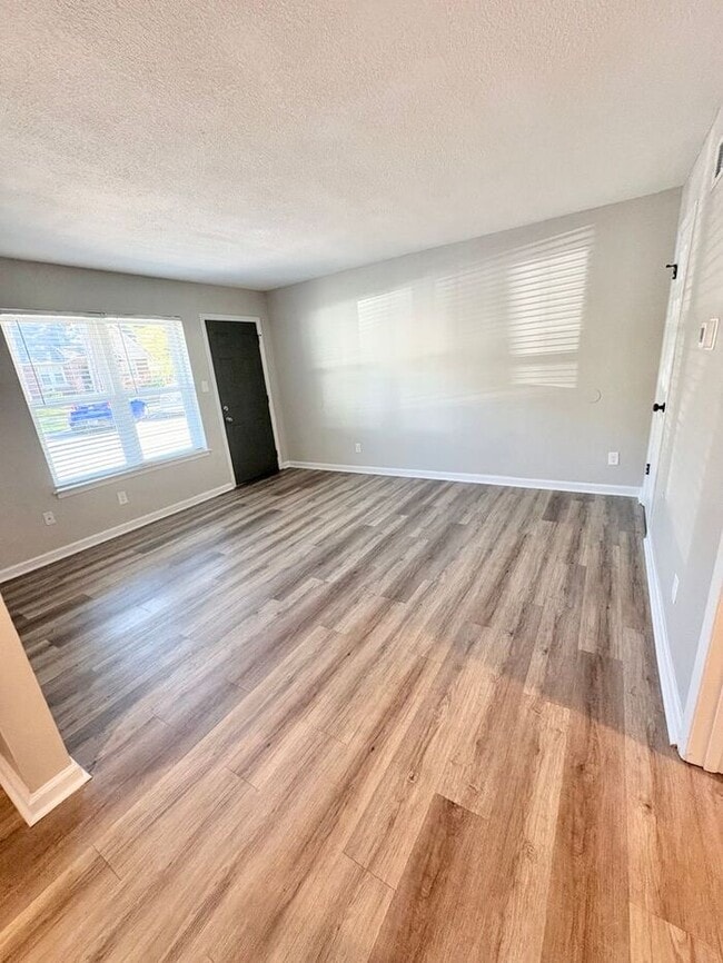 Building Photo - Steps from UofM & Highland Strip – First-Floor 2BR Apartment at The Den!