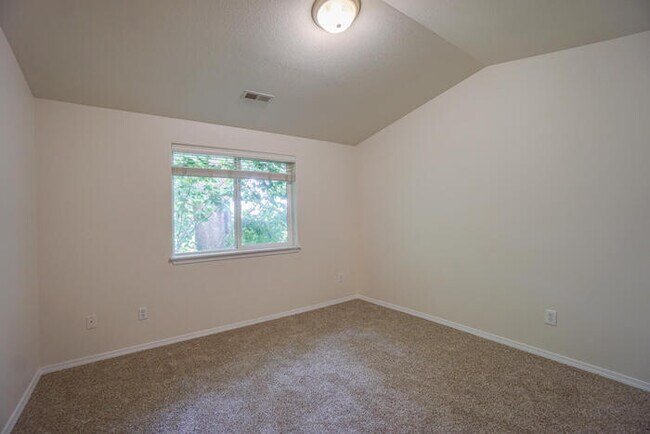 Building Photo - THREE BEDROOM TOWNHOME WITH GARAGE ACROSS FROM SHOPPING AND DINING