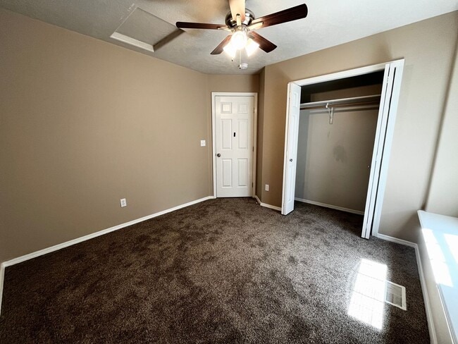Building Photo - 4 Bedroom Home with Bonus Room Potential & RV Parking!