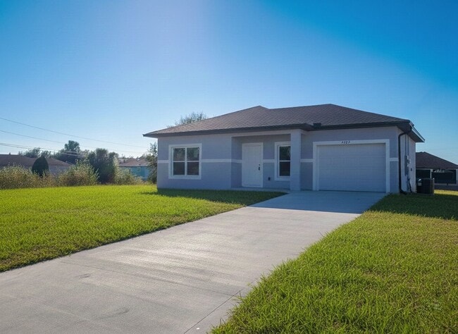 Building Photo - Brand New 2/2/1-PRIME SW LOCATION - Lehigh Acres
