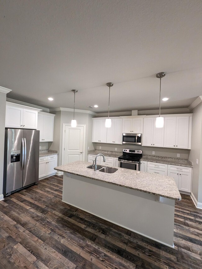 Building Photo - 8934 E River Dr