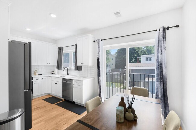 Building Photo - Movie in special, first 1/2 month rent is FREE! Charming 2-Bedroom Condo with 2 Full & 2 Half Bat...