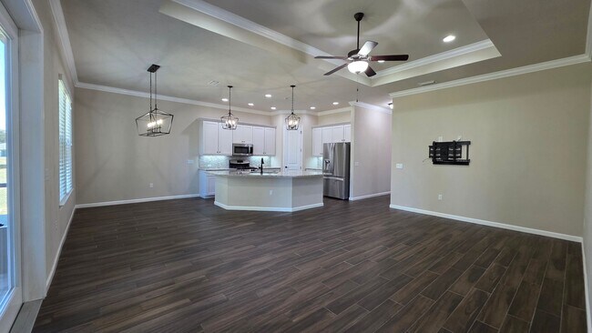 Building Photo - FOR RENT 4 BEDROOM 3 BATHROOM HOME