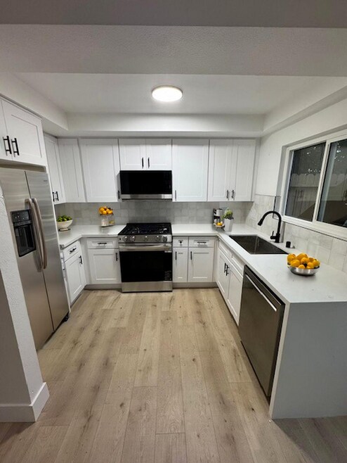 Building Photo - 8402 Larson Ave