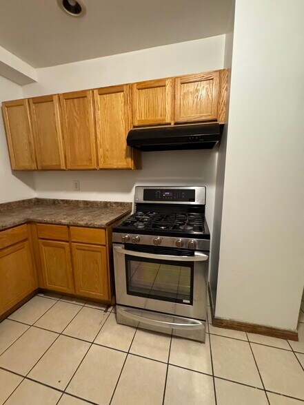 Kitchen stove - 104 W Main St