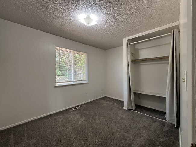 Building Photo - Charming Ranch Home with Sunroom or 4th Bedroom, Two-Car Garage and Fenced Backyard