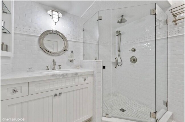 2 full en suite baths, powder bath - 3421 S Ocean Blvd