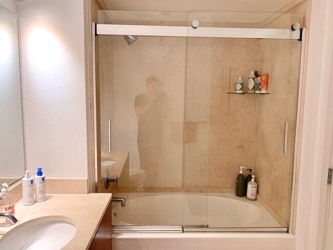 Large bathtub with upgraded glass doors - 630 Thomas L Berkley Way