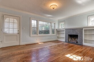 Building Photo - Updated 1928 Tutor w/ Original Touches and Large Fully Fenced Back Yard